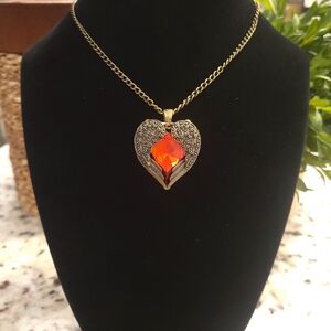 Sumni - Gold Winged Heart Necklace with Red Gemstone